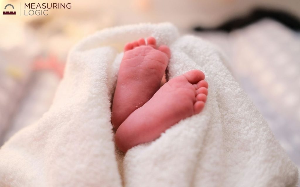 Feet of a newborn baby.