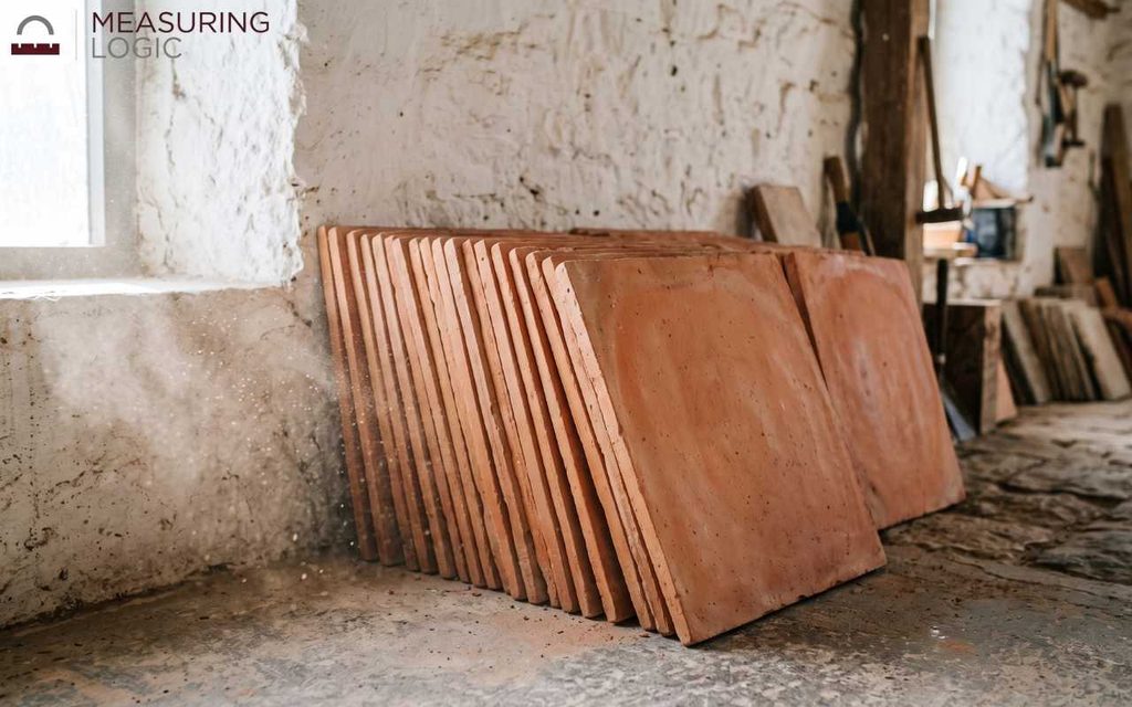 A stack of 18x18 inch floor tiles, a standard measurement in home flooring
