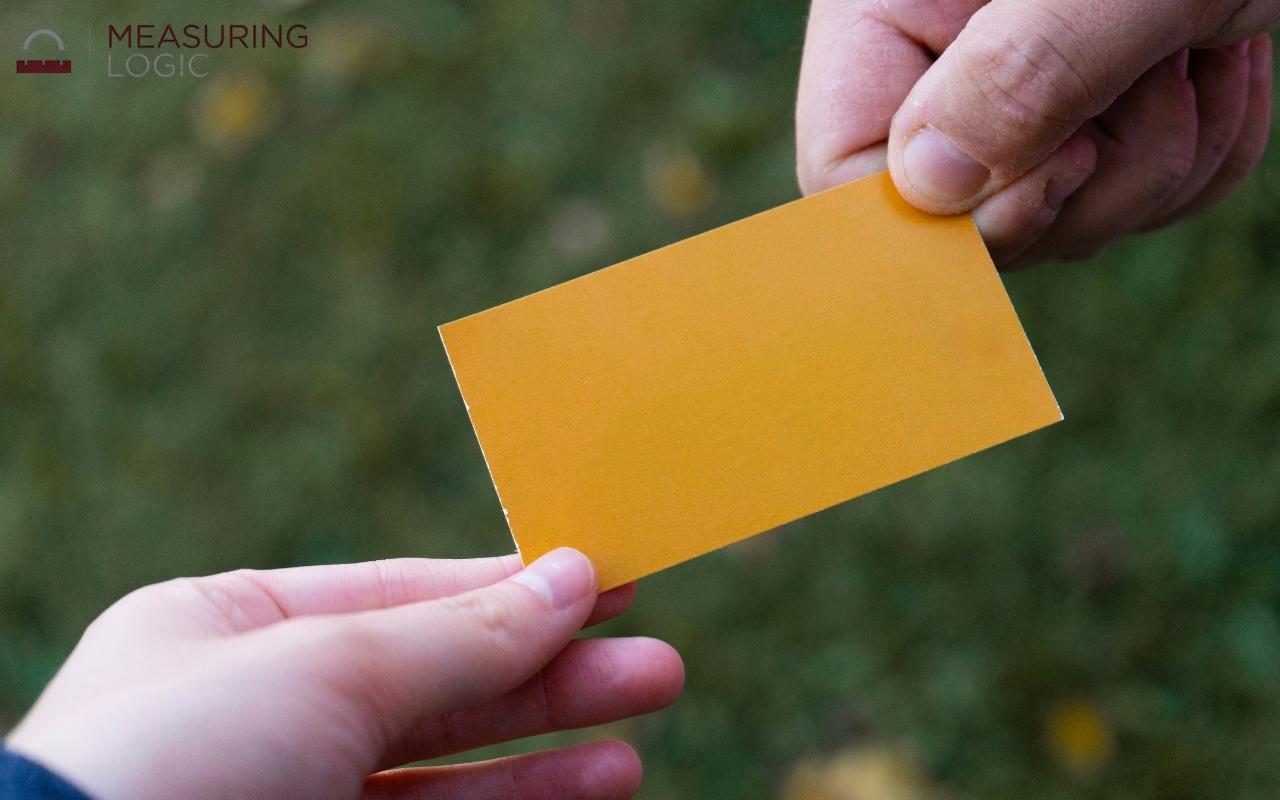 a yellow blank buisness card