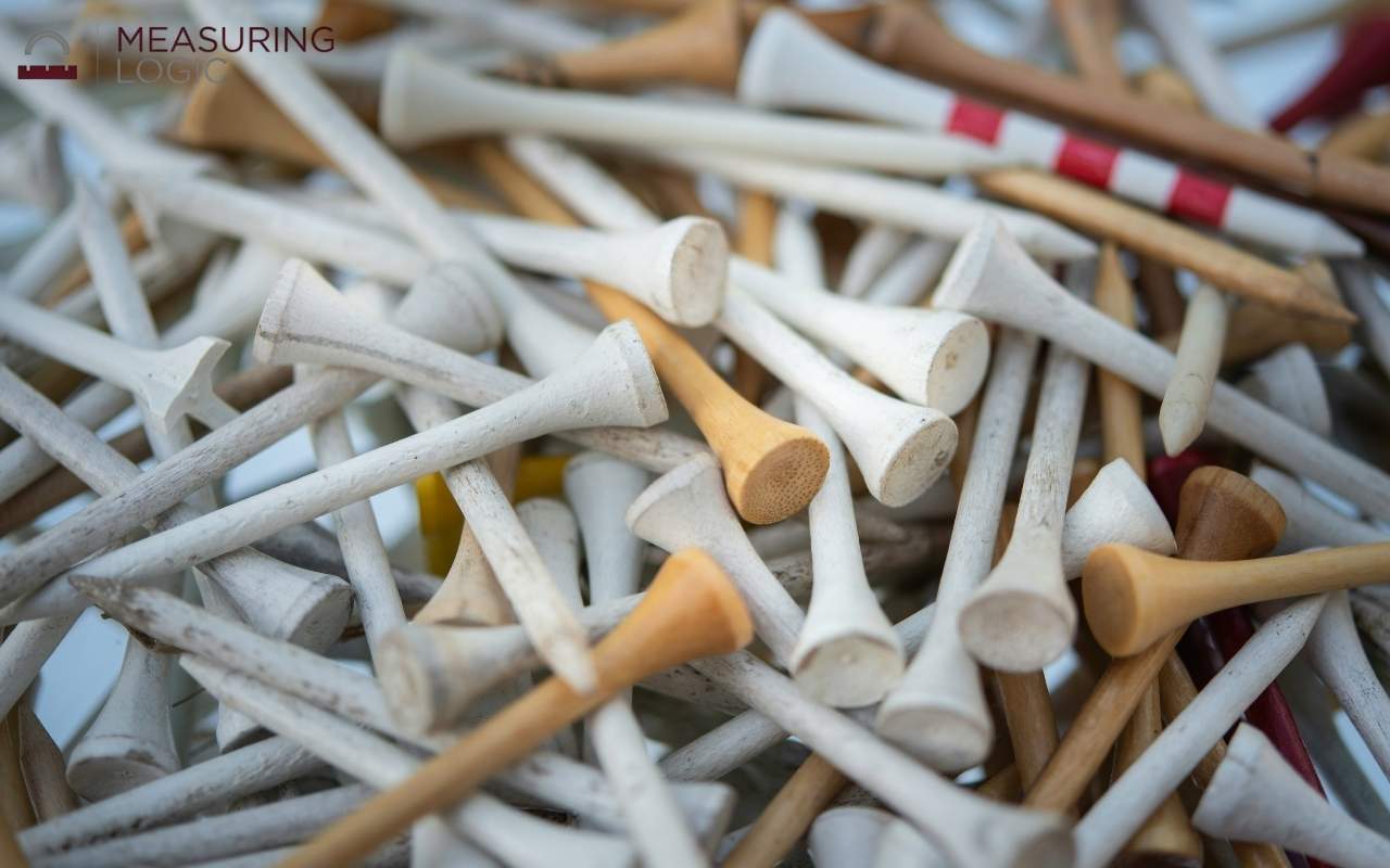 multiple wooden golf tees