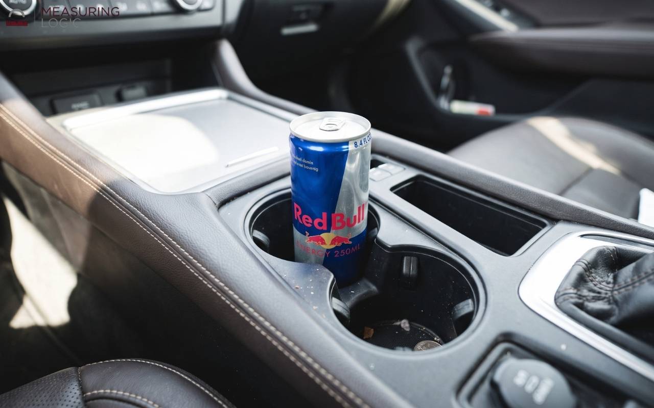8.4 oz Red Bull can fitting in a car cup holder