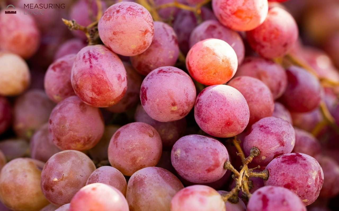 Close-up of red grapes, a fruit that is typically about 1 inch in size when it is plump 
