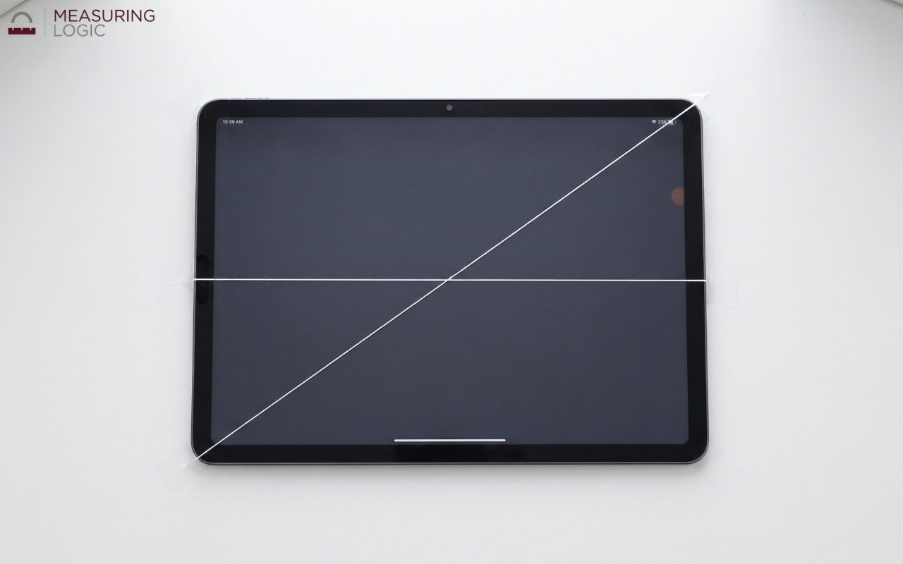 Tablet showing its diagonal screen size compared with its width.