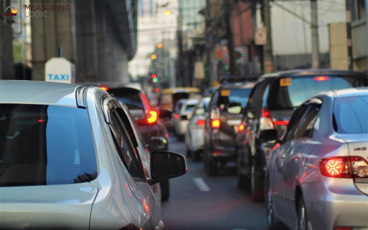 Rear view of cars stuck in urban traffic