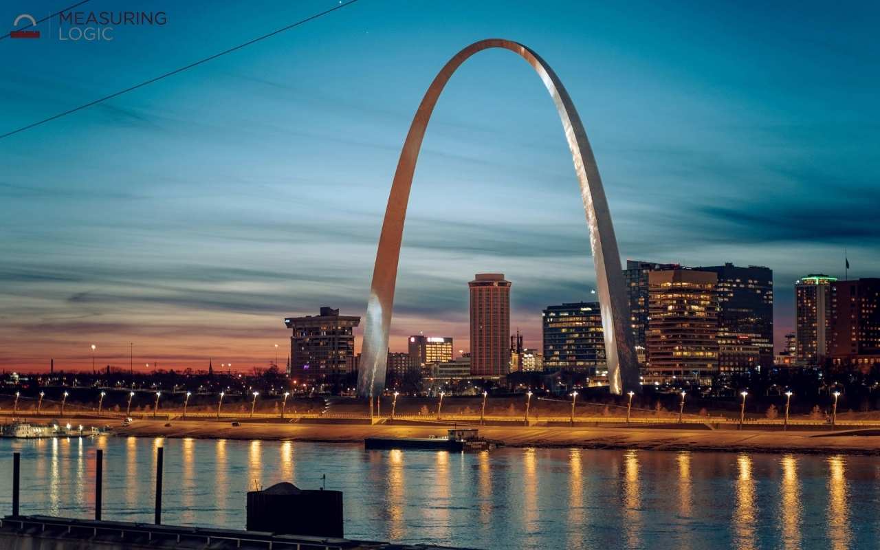 Gateway Arch illuminated at twilight, standing over 500 feet tall